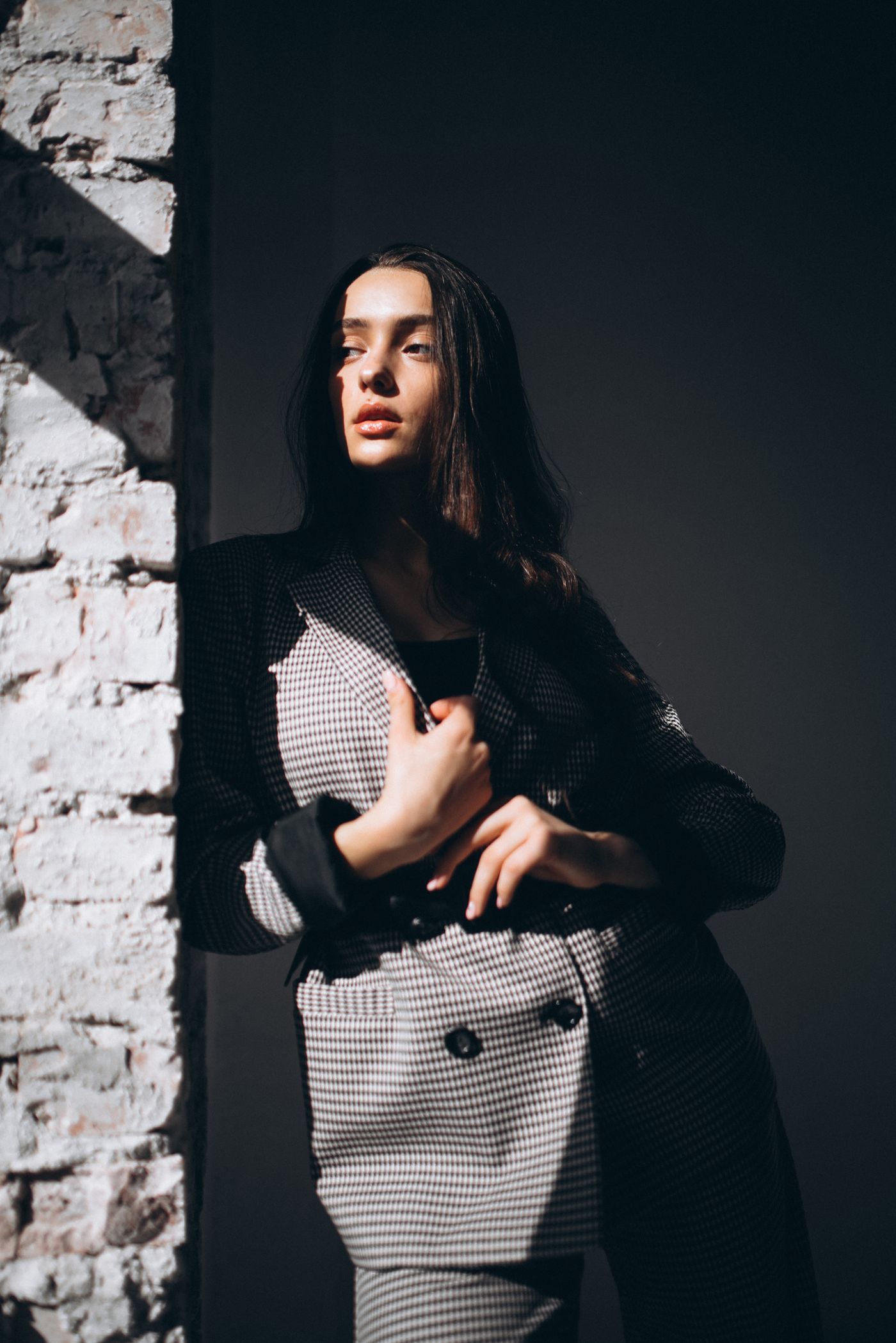 Tailored houndstooth suiting in low afternoon light
